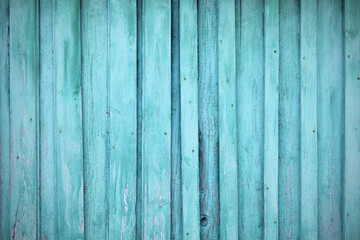 Fototapeta na wymiar Old wooden painted blue boards. Close-up. Vertical view. Background. Texture.