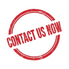 CONTACT US NOW text written on red grungy round stamp.