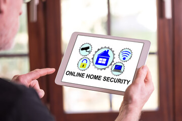 Online home security concept on a tablet