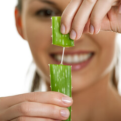 Woman with fresh aloe vera. Beauty face with anti age skin care aloe vera.