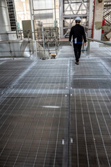 Metal grating walkway on the mill