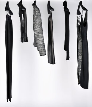 Elegant and trendy women's clothes hanging