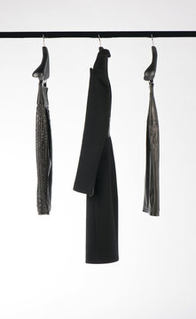 Elegant and trendy women's clothes hanging