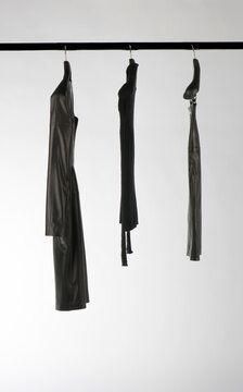 Elegant and trendy clothes for women hanging.
