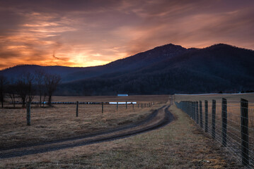 Sunset behind Old Rag Mountain viewed from an old dirt road on a farm outside of Shenandoah National Park.