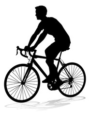 Fototapeta na wymiar A bicycle riding bike cyclist in silhouette