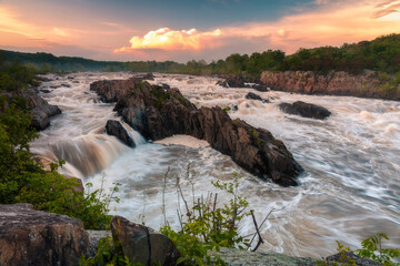 Stormy sunset skies over Great Falls Park in Virginia in the Summer.