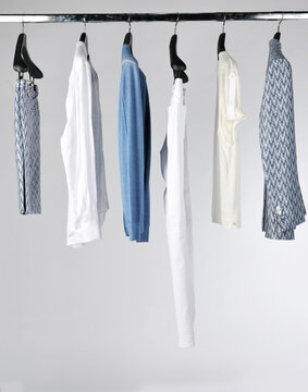 Elegant and trendy men's clothes hanging