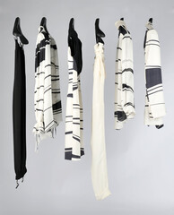 Elegant and trendy women's clothes hanging