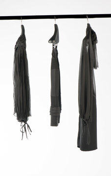 Elegant and trendy women's clothes hanging