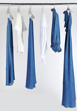 Elegant and trendy women's clothes hanging