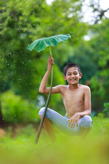 Cute indian little child enjoying with nature