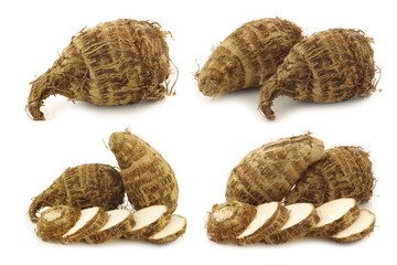 Fresh taro roots (colocasia) on a white background