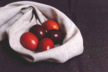 Easter pastries and colored eggs on a textile background. Traditional pastries for Orthodox holidays.
