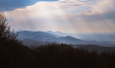 Fototapeta na wymiar Afternoon crepuscular rays illuminating over Shenandoah National Park in the early parts of Winter.
