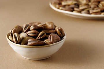 Dried fava beans (Vicia faba) close-up. Vegan protein food.