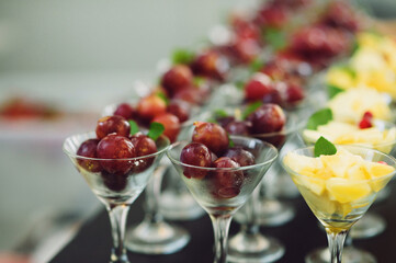 glasses with grape and pineapple