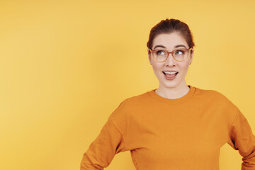 Young woman having a bright idea or making a breakthrough