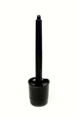 Graphic tablet pen with holder on white background.        