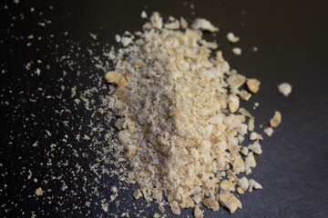 oat bran on a black base