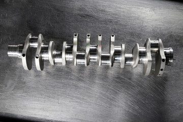 New engine crankshaft. Spare part.