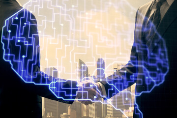 Double exposure of brain hologram and handshake of two men. Partnership in IT industry concept.