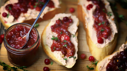 Toast with pate and cranberry jam. Goose pate toast.