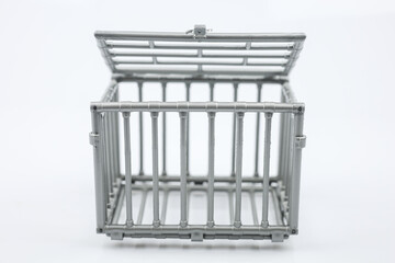 Prison bars isolated on white. Steel cage.
