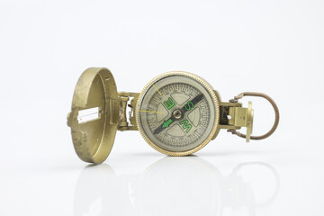 Frontal view of compass isolated on white background.
