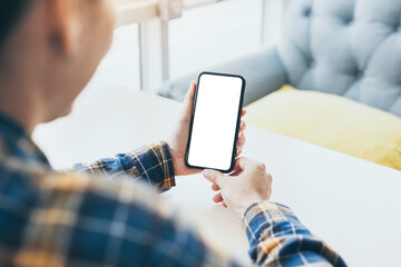 cell phone blank white screen mockup.woman hand holding texting using mobile on desk at office.background empty space for advertise.work people contact marketing business,technology
