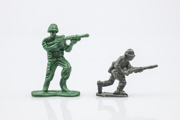 A close up of a toy soldier in the war on a white background