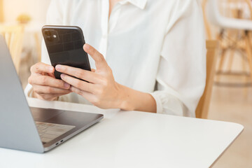 woman work using texting cell phone typing computer.student study education online learning.adult professional chatting on laptop,mobile contact us at Thinking business plan.connecting people concept
