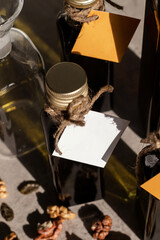 Reusable dark glass bottle and different nuts seeds. Eco friendly packaging is reusable. Zero waste.