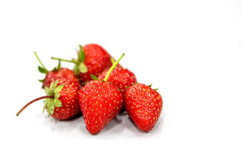 Strawberry isolated, with green leaf, closeup ,macro photo.