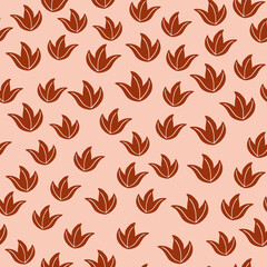 Random little foliage abstract silhouettes seamless doodle pattern. Orange leaves on pink background.