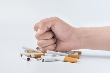 Human hand crushed some cigarettes