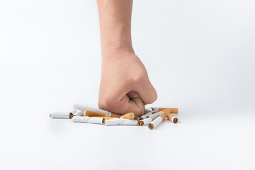 Human hand crushed some cigarettes