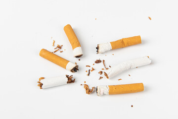 Group of cigarettes lying isolated on white background