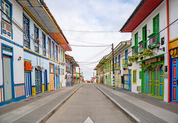 A beautiful red street with colonial architecture in the town of Filandia, Quindío, Colombia