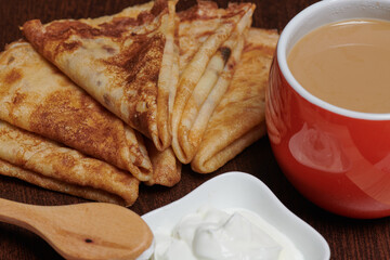 photo pancakes yogurt a cup of coffee on a blackboard