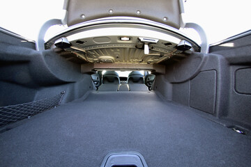 Trunk in a sedan with lowered backrests