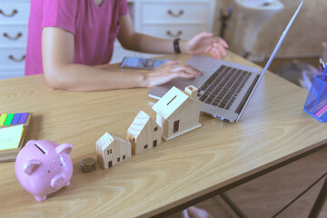 close up of house model when women work from home