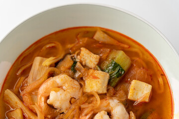 Spicy Korean-style noodle with vegetables and seafood.