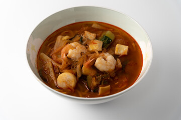 Spicy Korean-style noodle with vegetables and seafood.