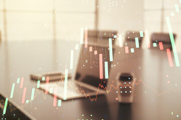 Double exposure of abstract creative financial chart on modern laptop background, research and...
