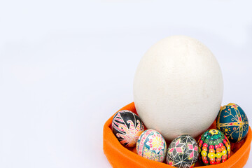 Easter eggs in an orange basket.