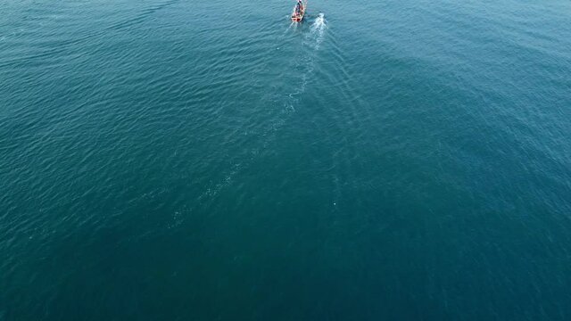 Fishing boat off Ladghar beach at Dapoli, located 200 kms from Pune on the West Coast of Maharashtra India.