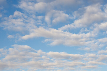 Sky, blue, saturated, bright colors and many clouds