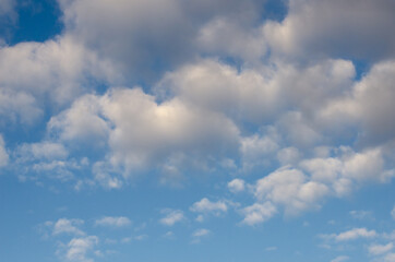 Sky, blue, saturated, bright colors and many clouds