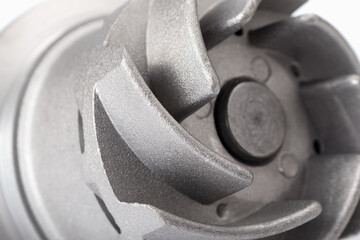 Close up of vanes of water pump for car cooling system.